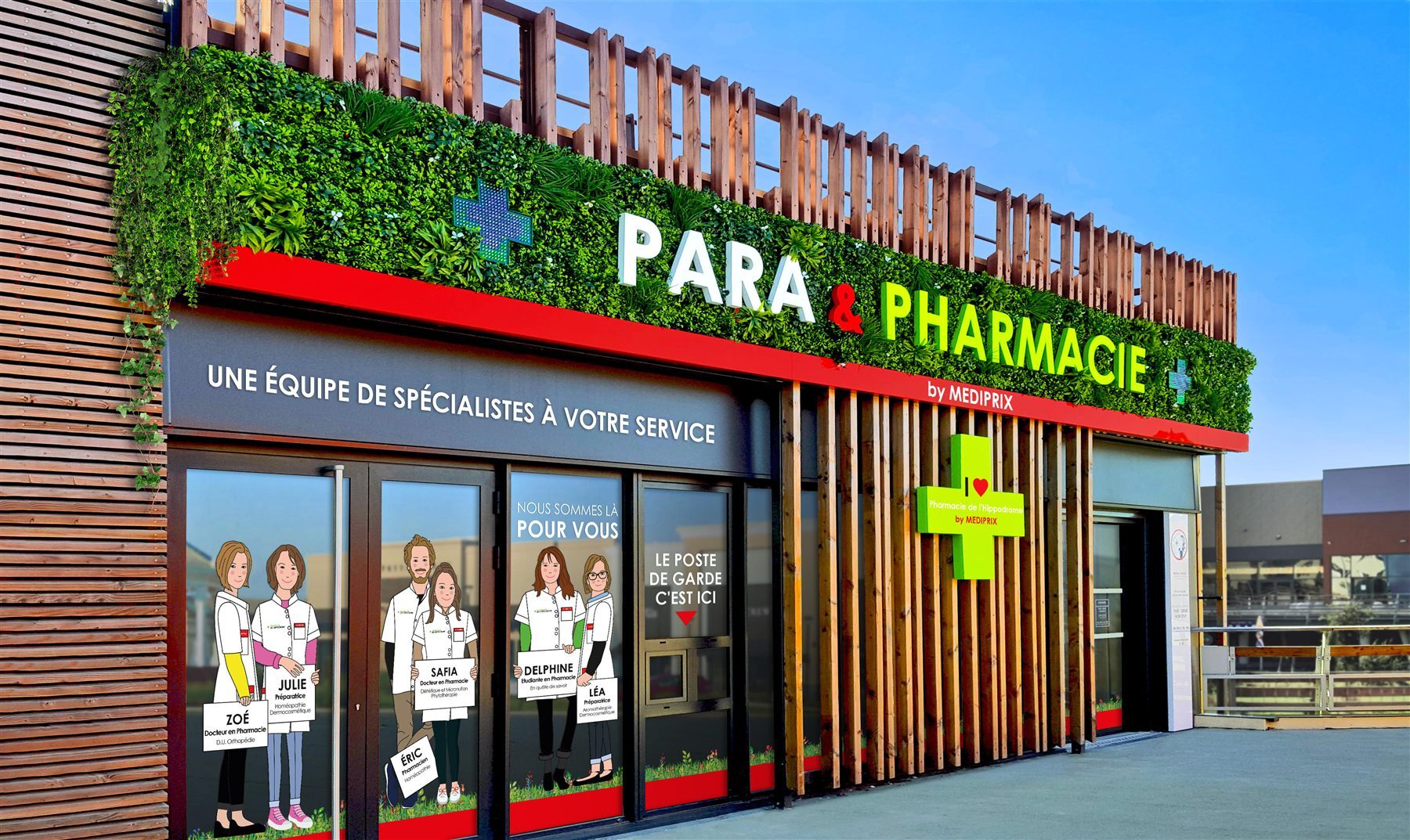 Façade d'une pharmacie Médiprix : mur végétal sur toute la longueur, bardage bois, et vitrophanie présentant l'équipe en illustrations